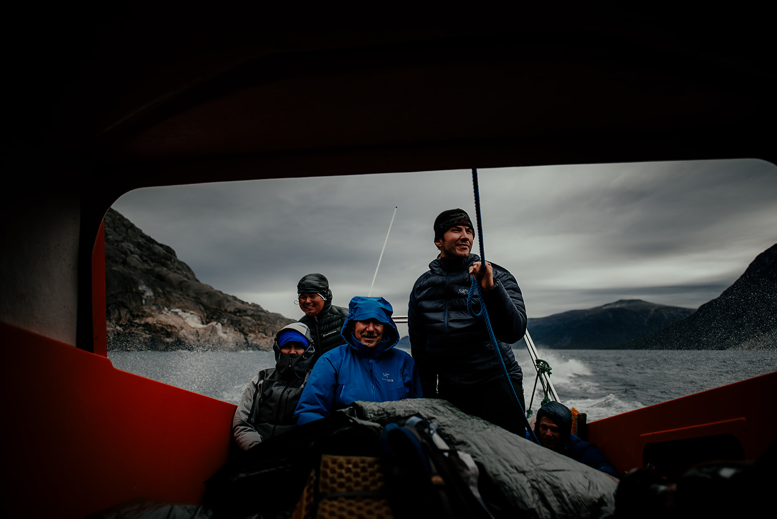 group of travelers in a boat on Greenland