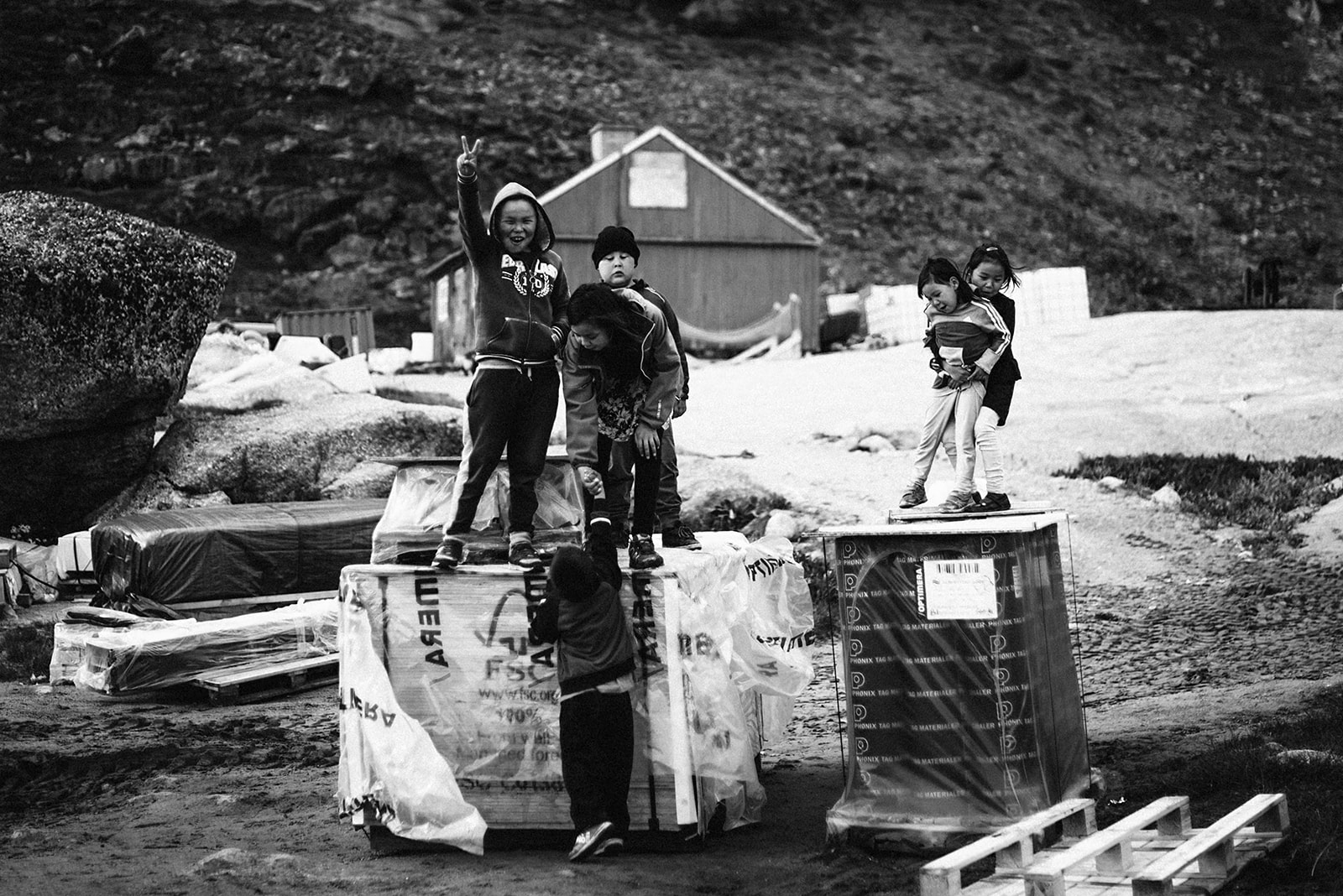 kids playing on building site in a small village on Greenland