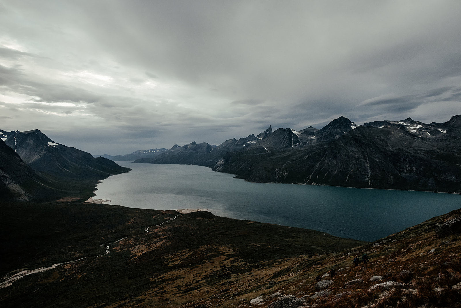view on fjord an mountain range on Greenland