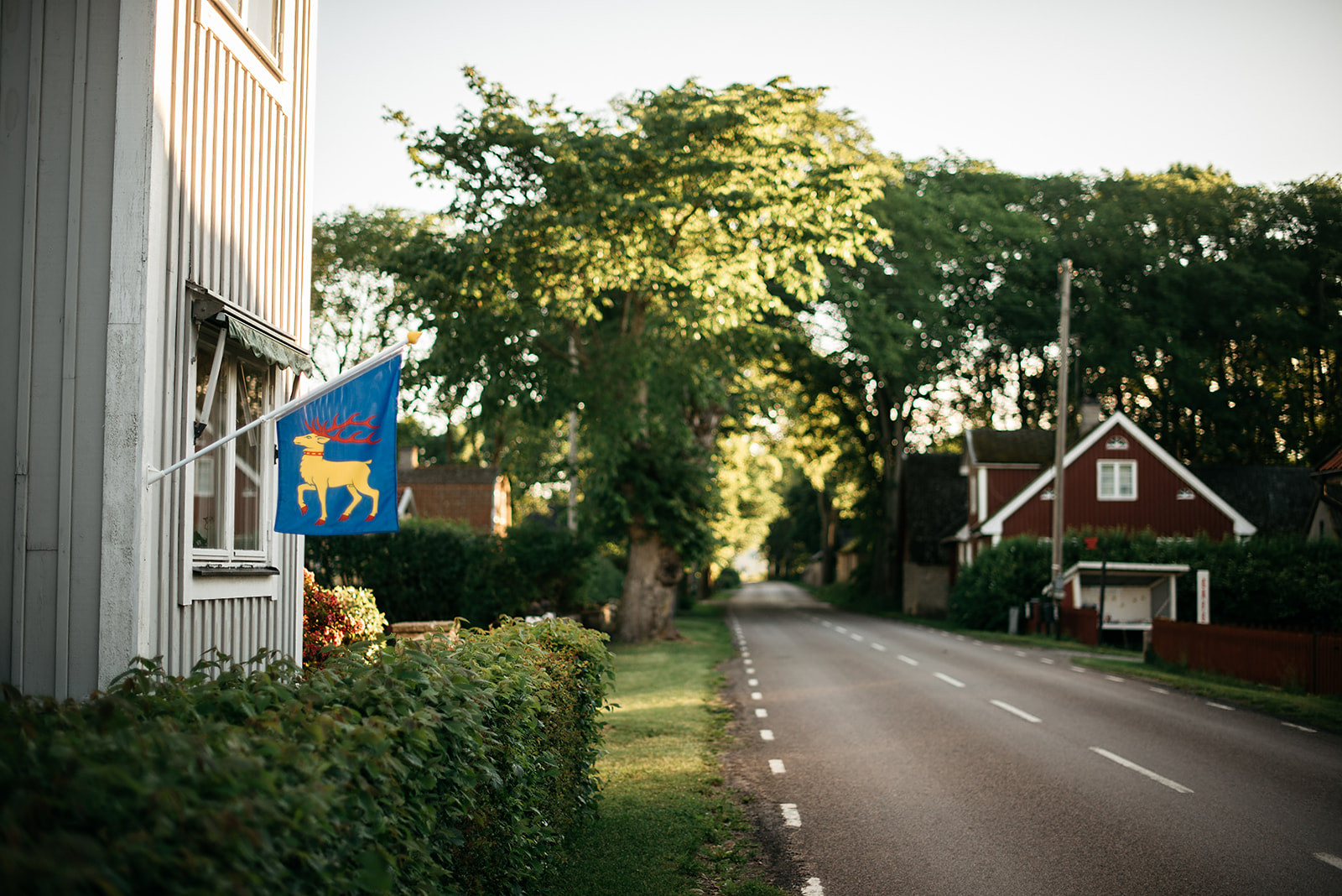 flag of the island of Öland at a picturesque house in Sweden