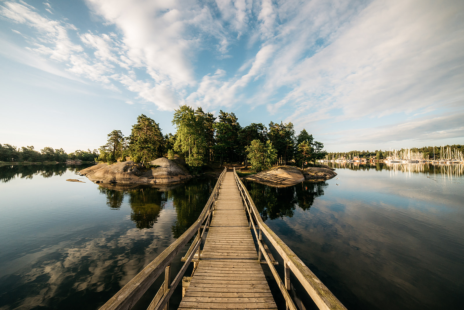 small island connected with wooden bridge in Sweden