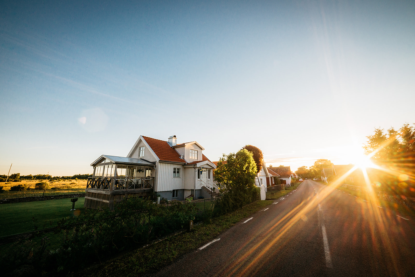 sunrise over a small settlement in rural Sweden