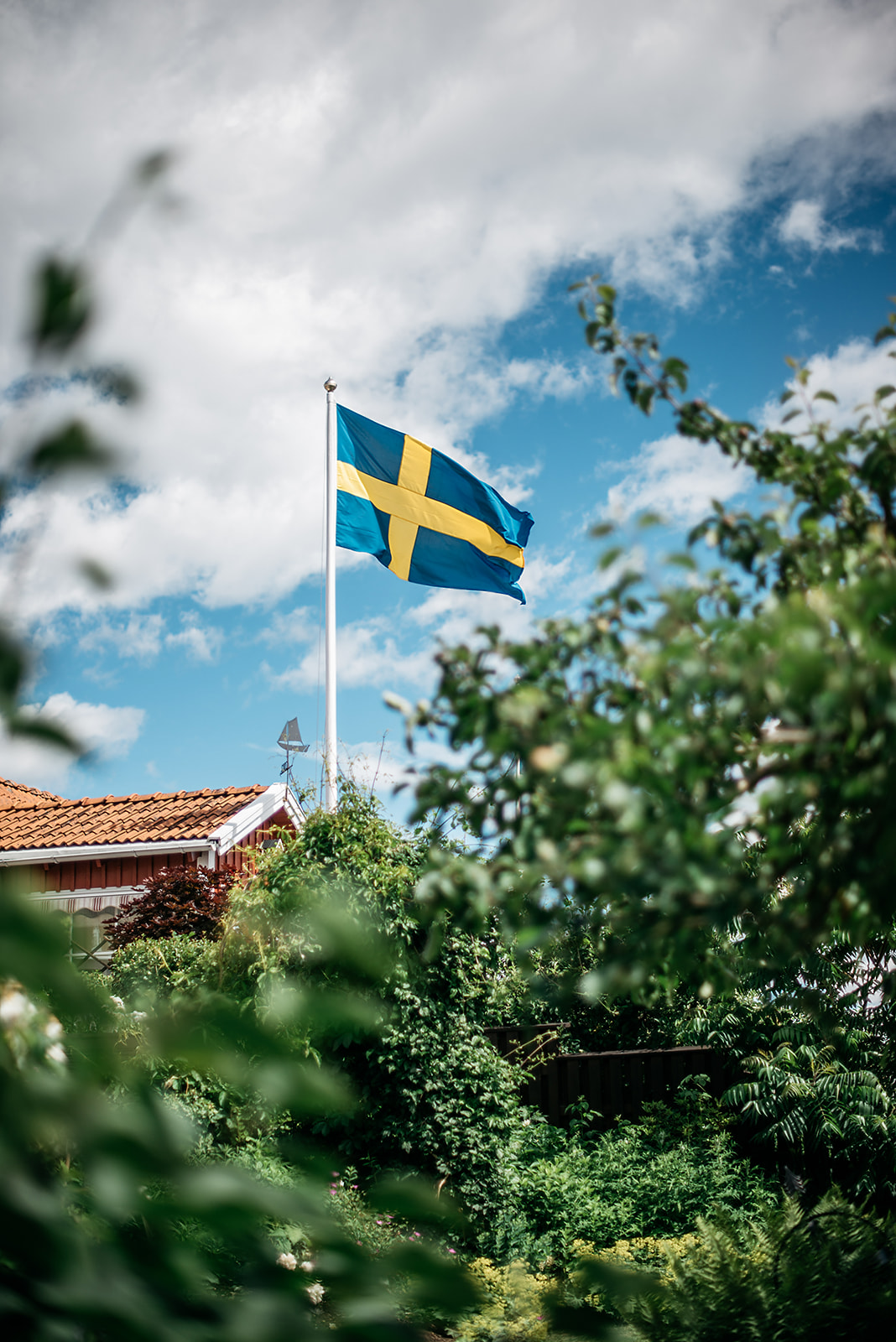Swedish flag in the wind on a bright day