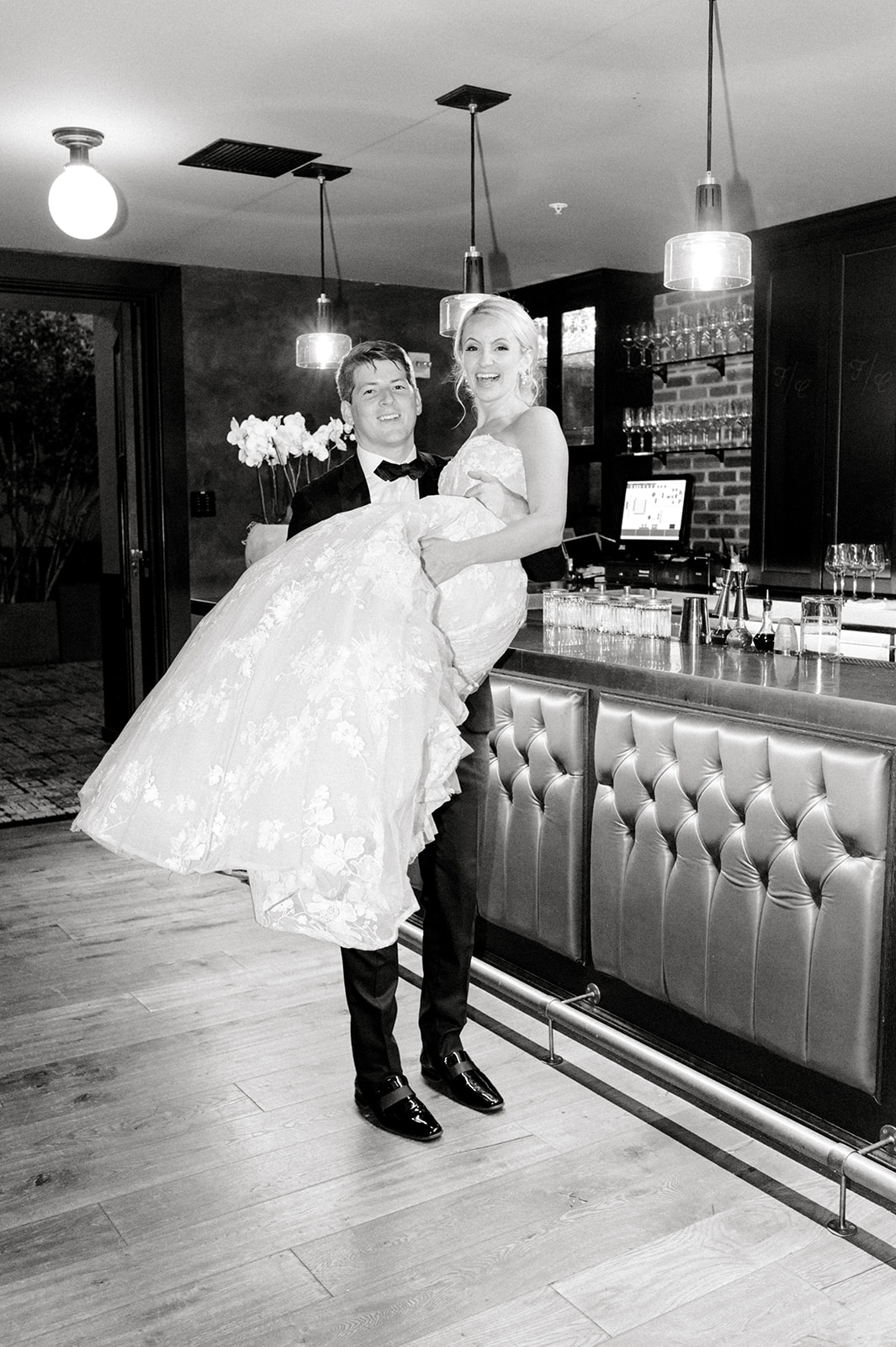 chic moment of bride and groom in black and white for Secret Urban Garden Wedding at Philadelphia’s Fitler Club