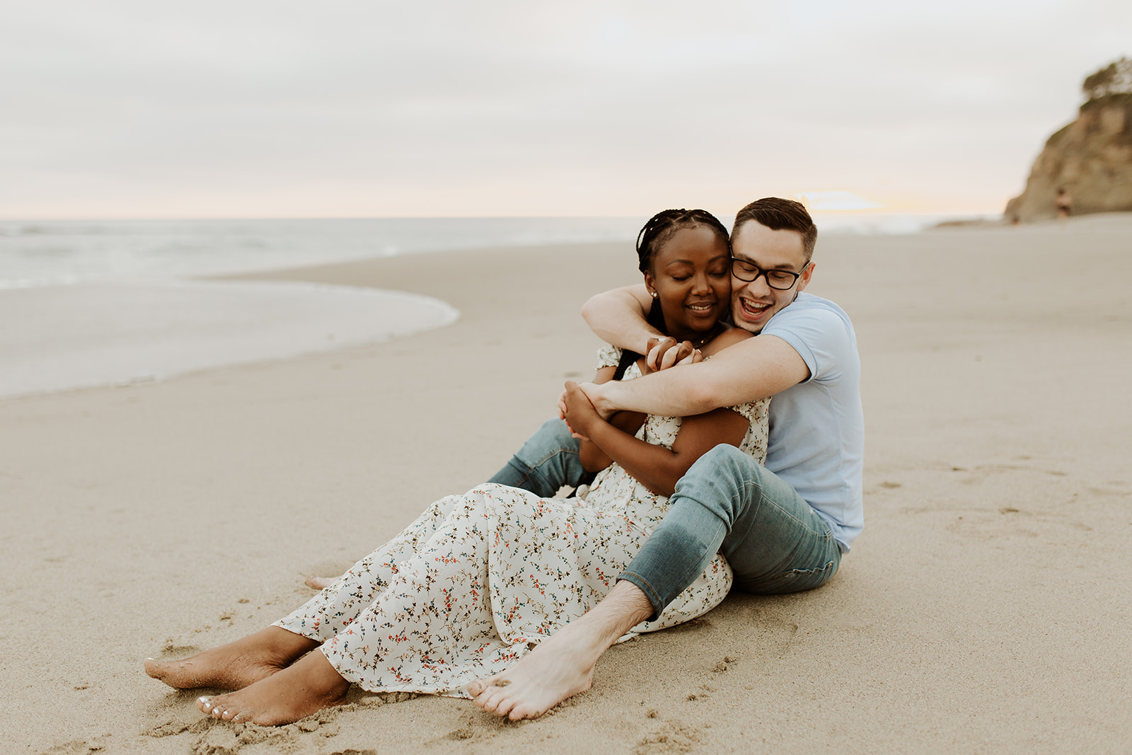 couple enjoys Laguna Beach California sunset engagement session