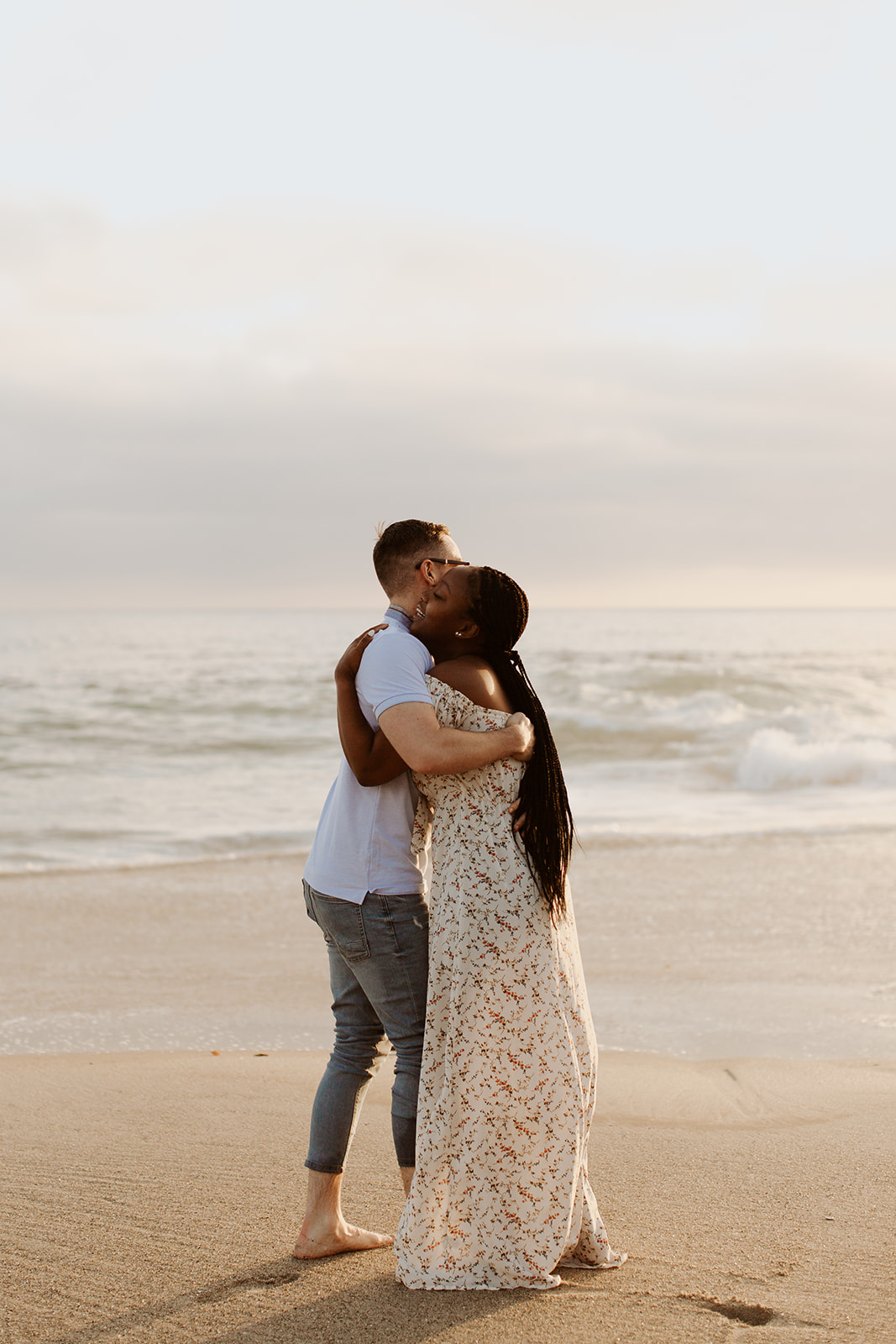 couple enjoys Laguna Beach California sunset engagement session