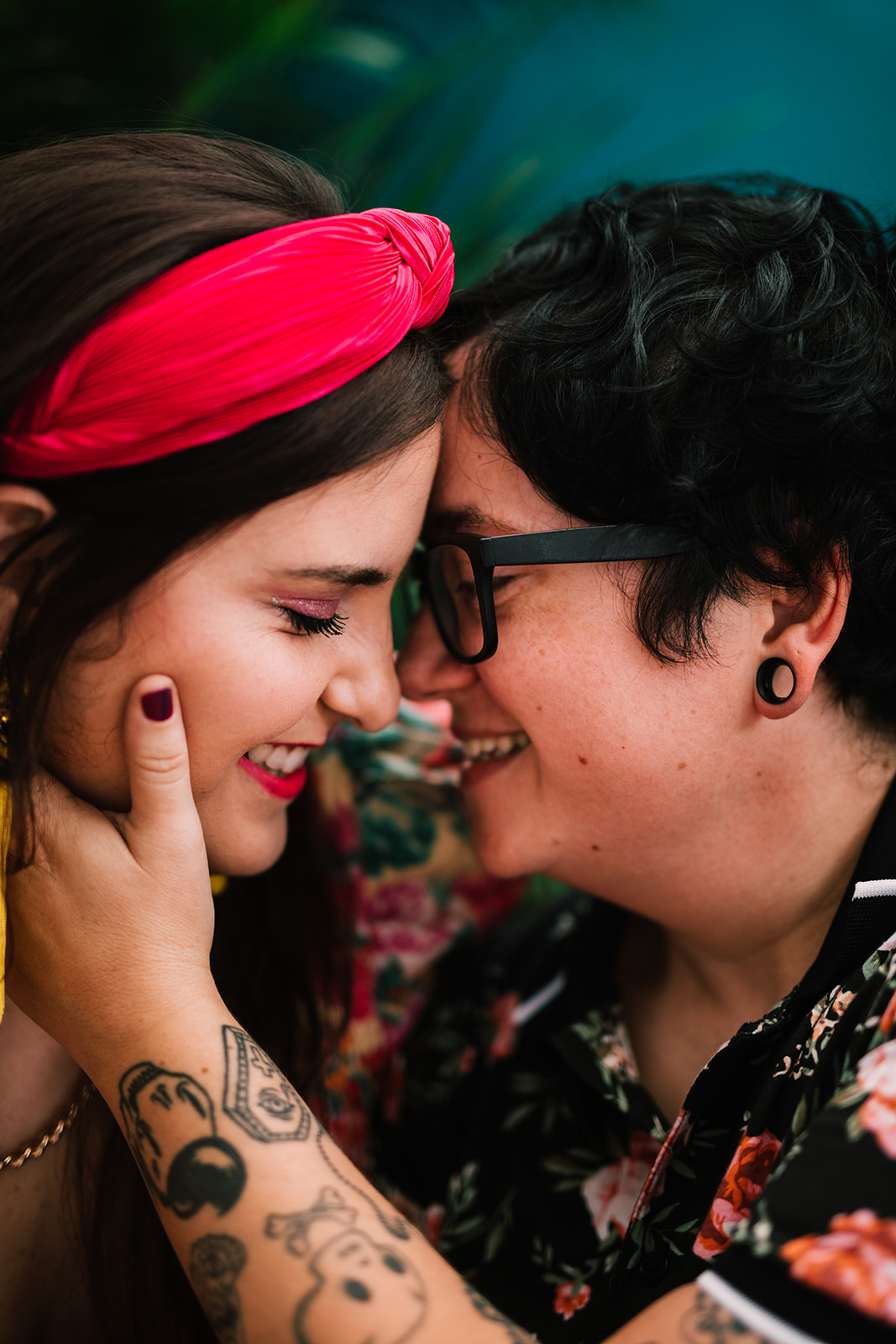 An LGBTQ couple smiling and in love in San Juan Puerto Rico