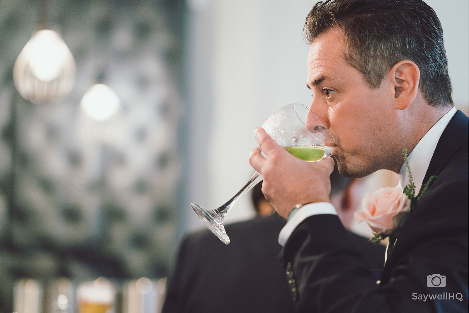 The Chequers Inn Wedding Photography - the groom has a stiff drink before the start of the ceremony
