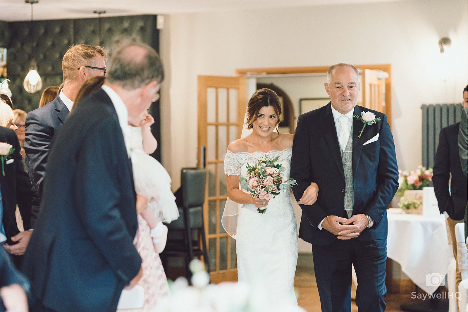 The Chequers Inn Wedding Photography - bride and her father walking down the wedding aisle