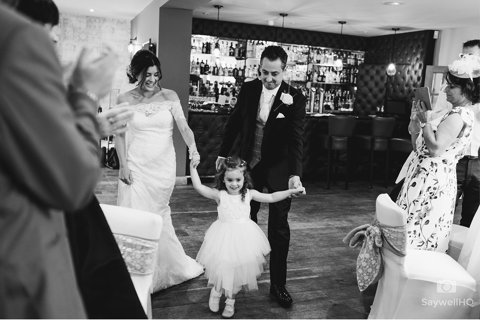 The Chequers Inn Wedding Photography - the bride and groom are announced into the wedding breakfast room
