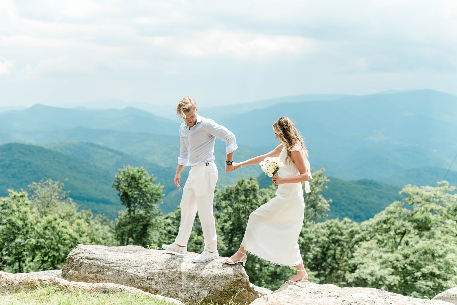 An NYC couple who eloped in Banner Elk, NC at The Artisanal Restaurant and Eagles Nest. 