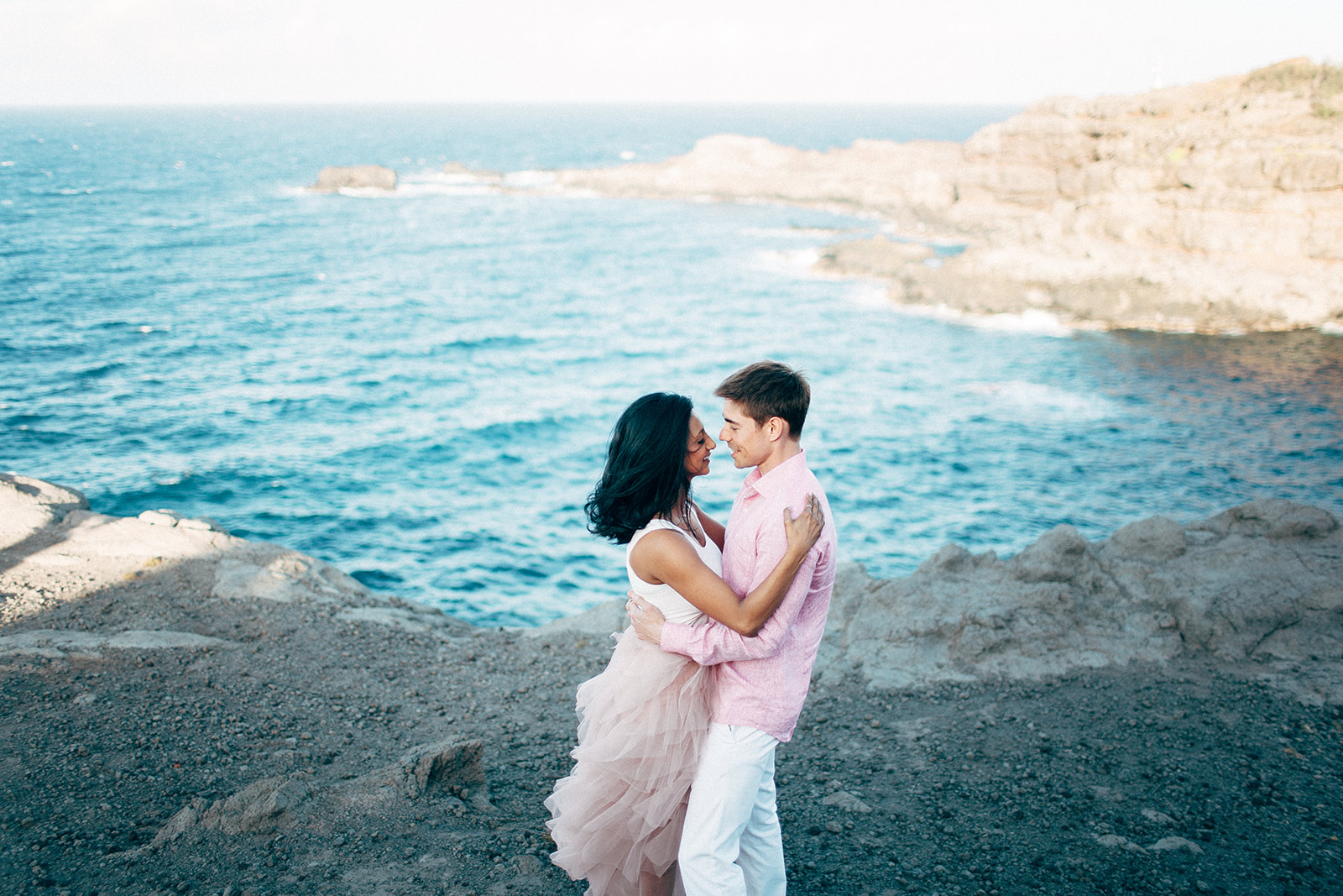 Cliffside engagement photos for a couple who eloped in Maui
