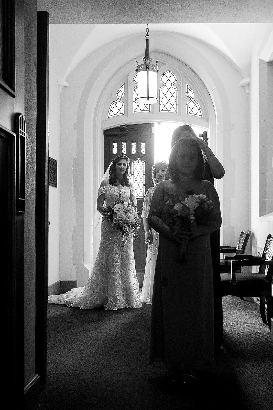 Bride waits for wedding ceremony to start in St. Sebastian’s Church in Providence Rhode Island