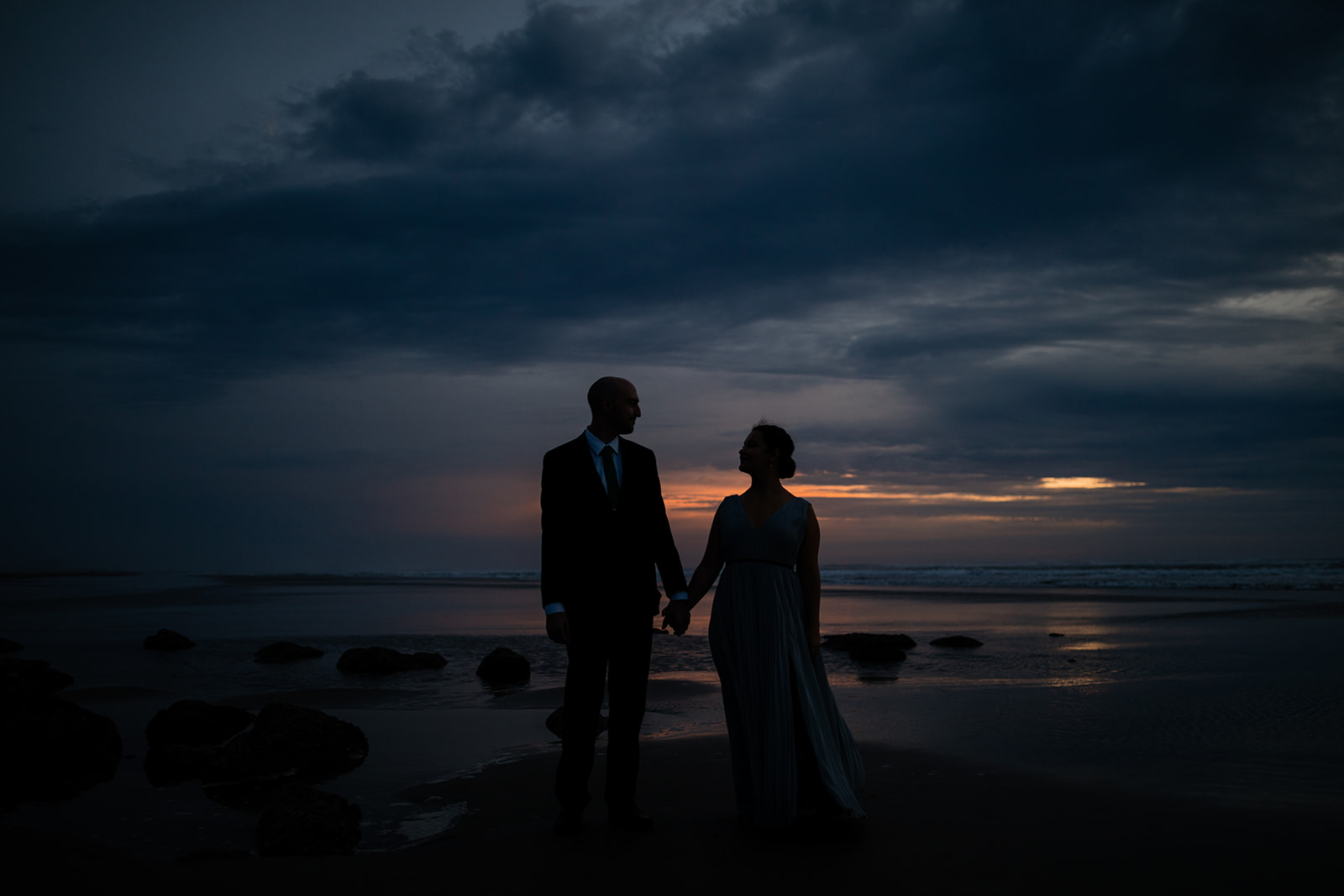 Sunset silhouette wedding photo