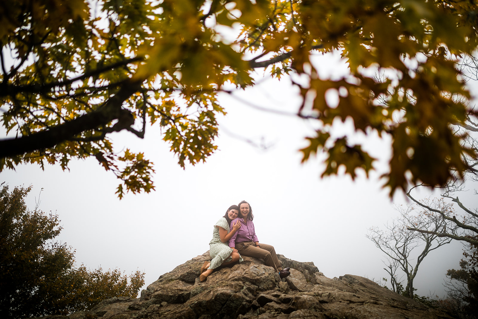 Queer mountaintop engagement photos