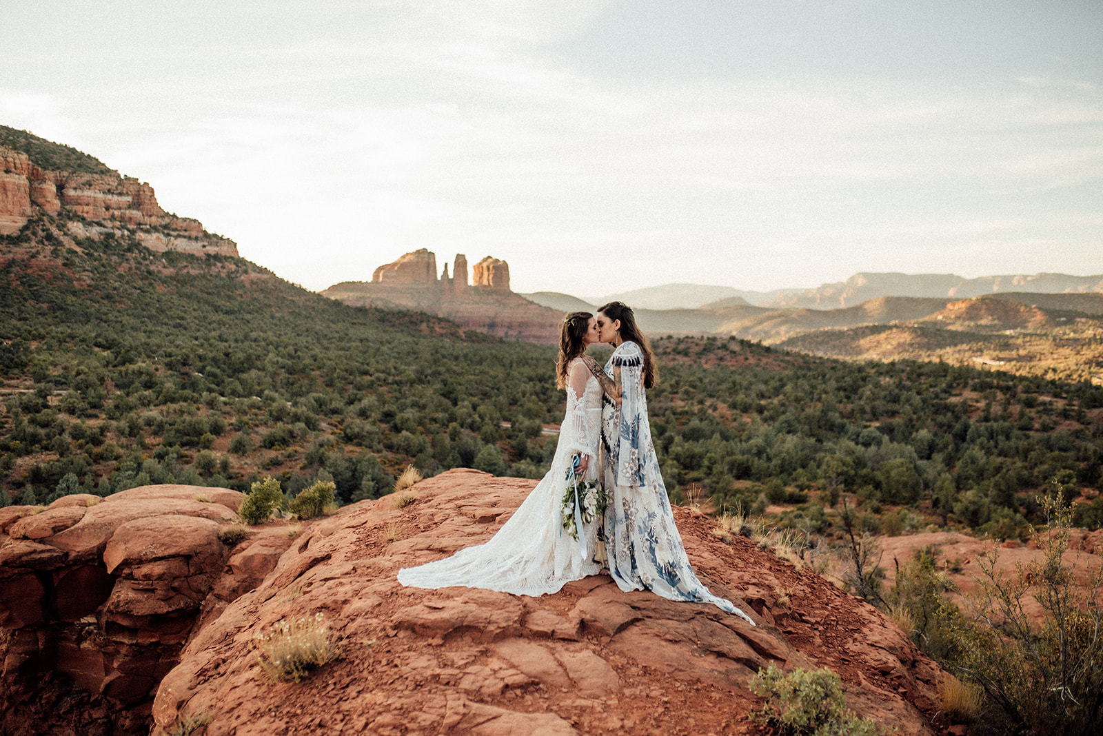 lgbtqia+ elopement couple with views of Cathedral rock in Sedona, AZ