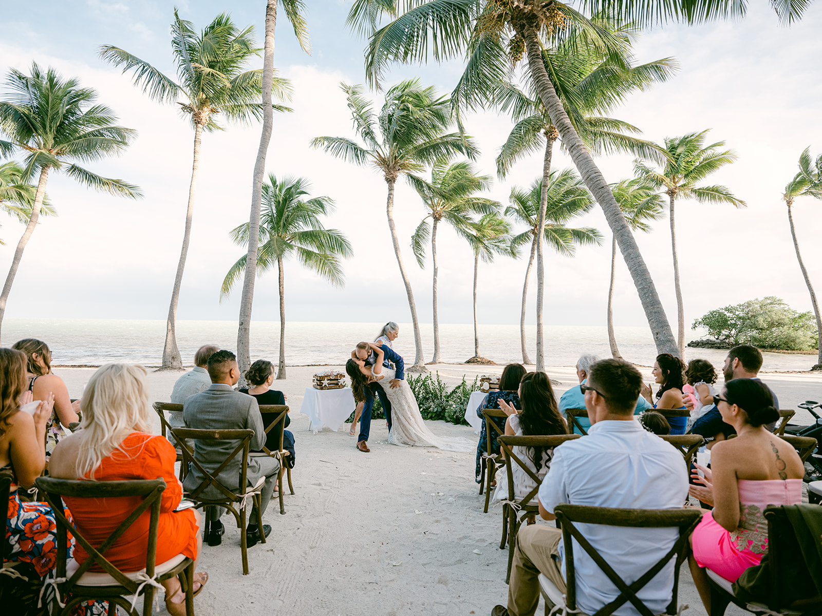 WEDDING COUPLE HAVE A BEACH FRONT CEREMOY IN ISLAMORADA FLORIDA CHEECA LODGE RESORT Casitas