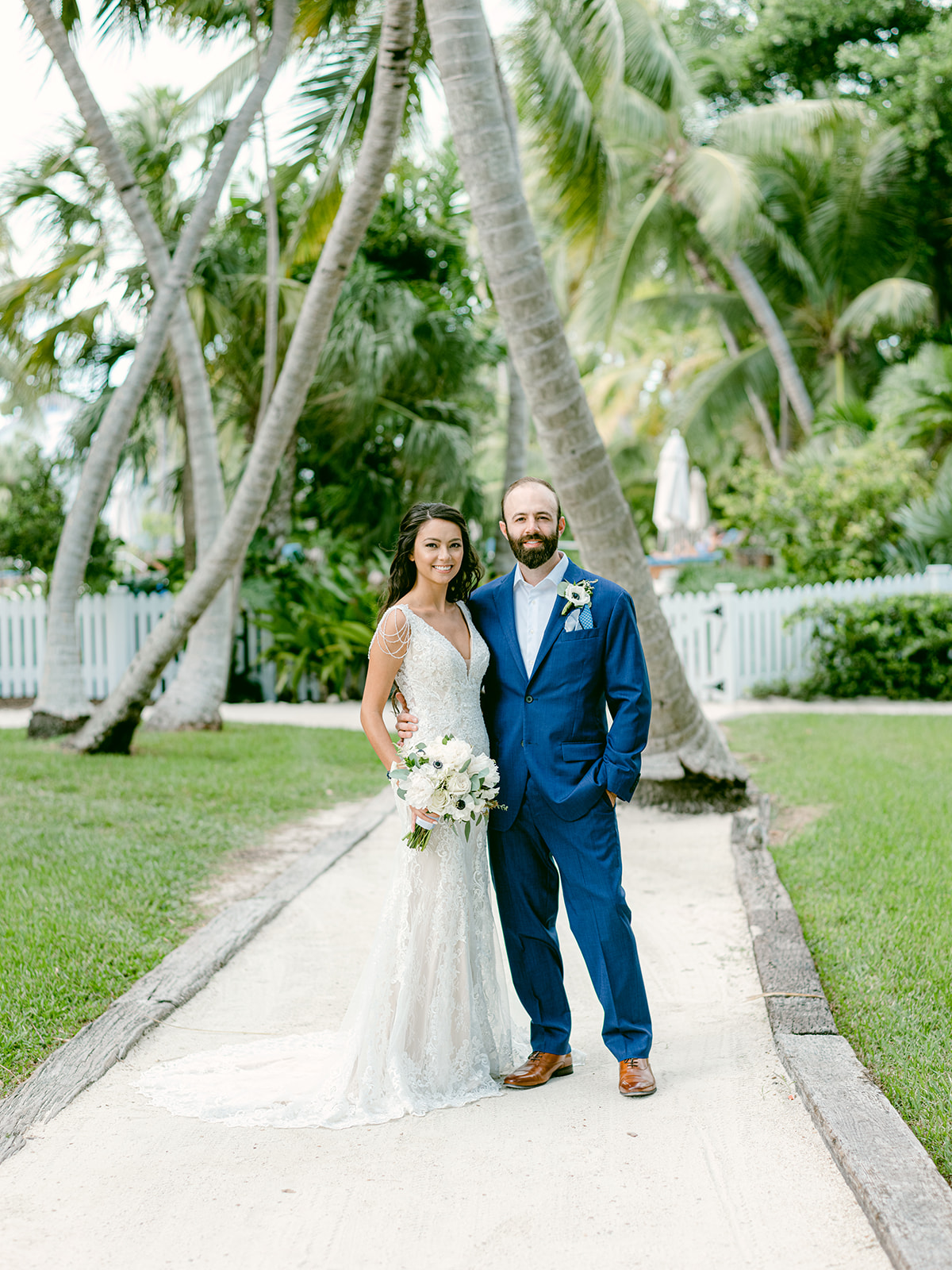 WEDDING COUPLE HAVE A BEACH FRONT CEREMOY IN ISLAMORADA FLORIDA CHEECA LODGE RESORT