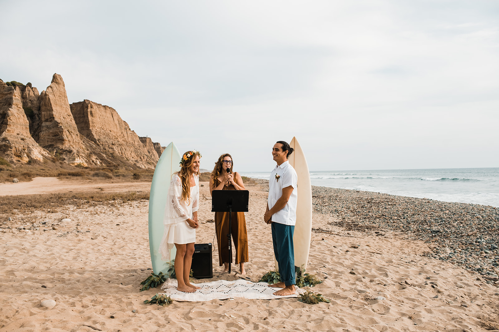 surfboard decor at coastal wedding ceremony 
