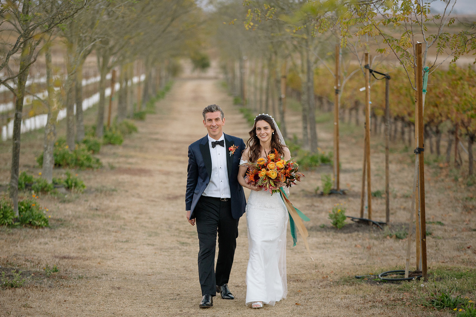 Bride and groom in the vineyard at Jacuzzi Winery in Sonoma