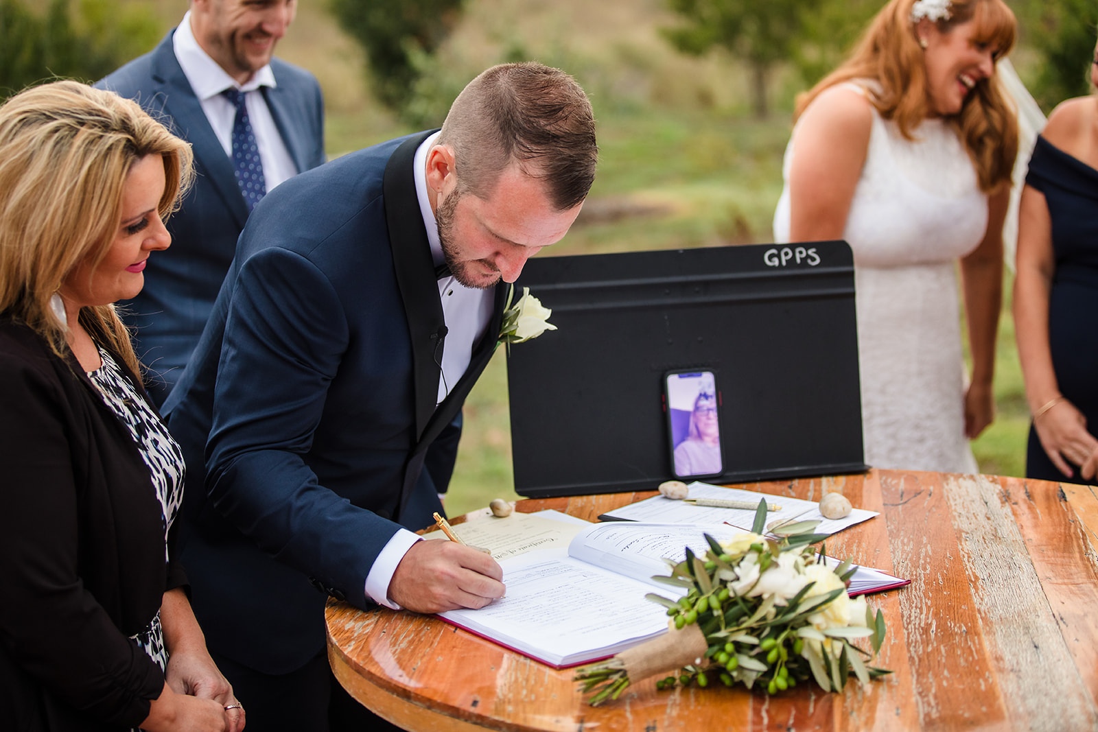 groom signing papers