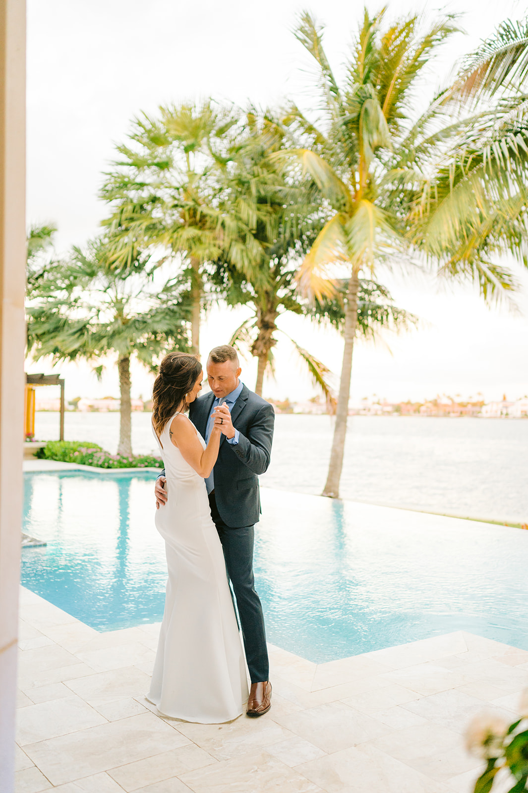 Naples Florida wedding photographer captures the groom's reaction to seeing his bride for the first time
