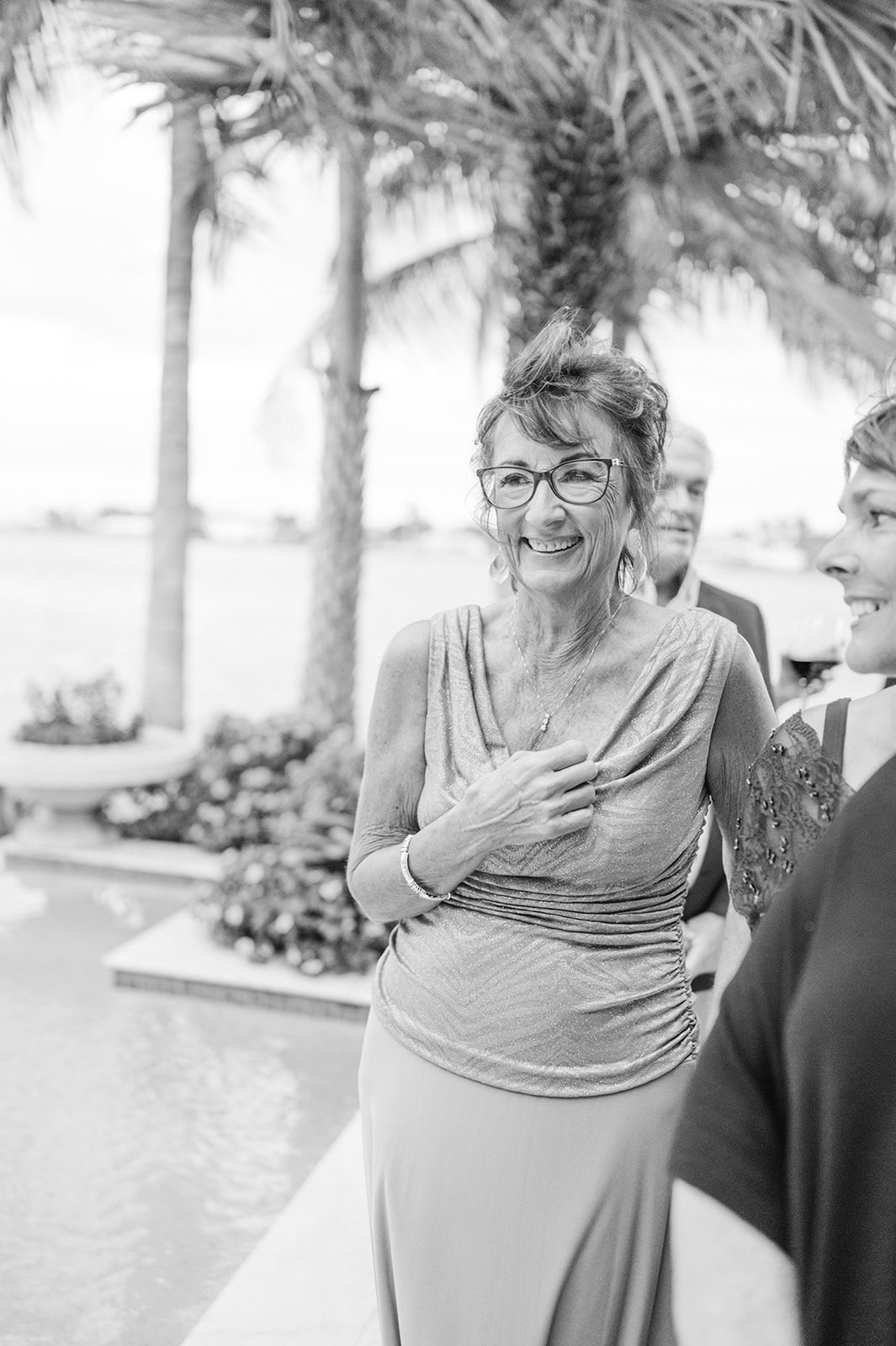 Naples Florida wedding photographer captures the newlyweds walking down the aisle together
