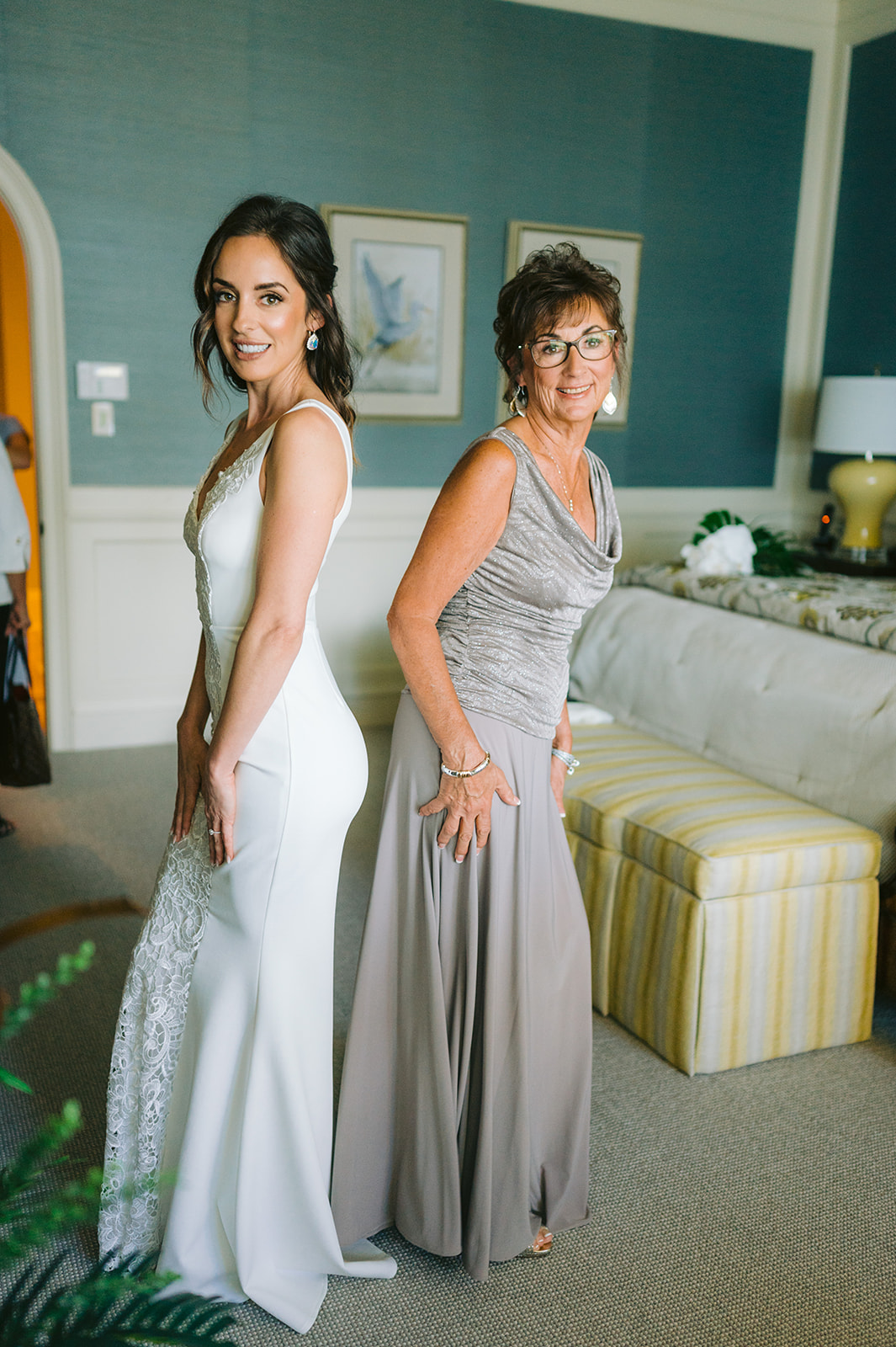 Candid moment: Naples FL wedding photographer captures the bride and her bridesmaids
