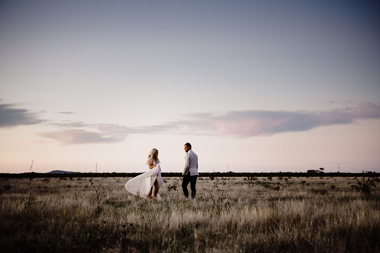 Sunset wedding photo, Griffith. Wedding location, Victoria. Beautiful sunset bride and groom's photo in Albury Wodonga.