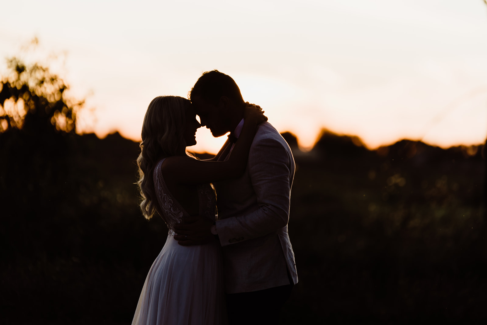 Sunset wedding photo, Griffith. Wedding location, Victoria. Romantic sunset bride and groom's photo in Albury Wodonga.