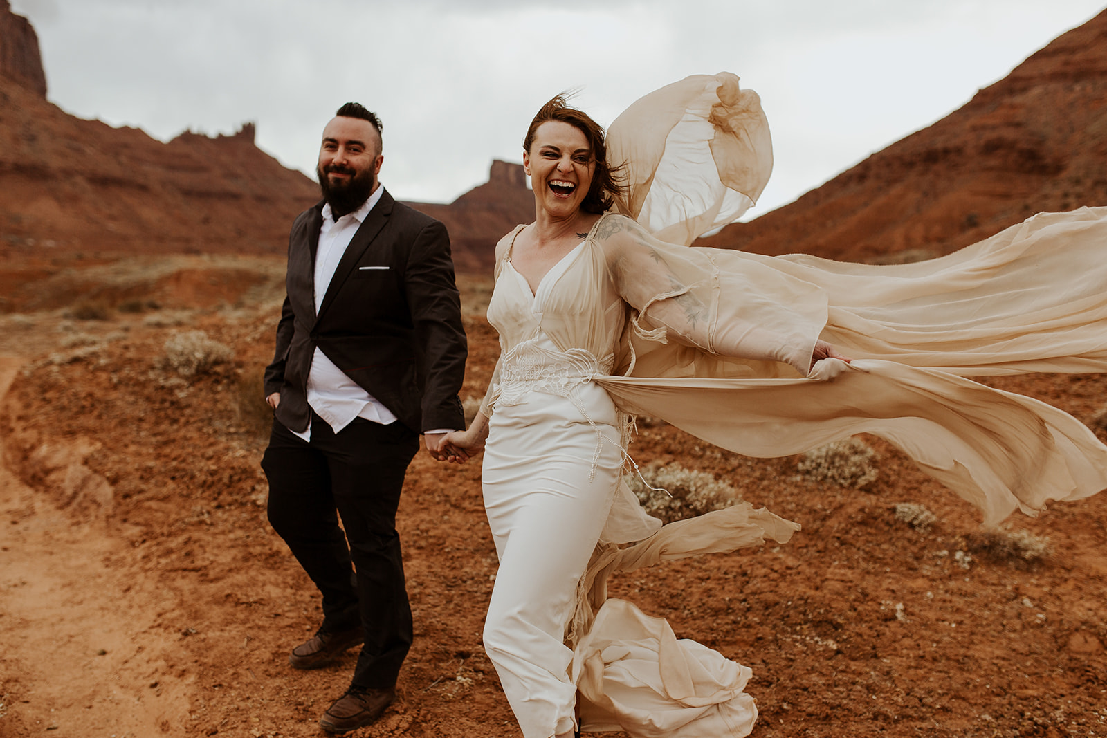 couple explores Moab during outdoor elopement