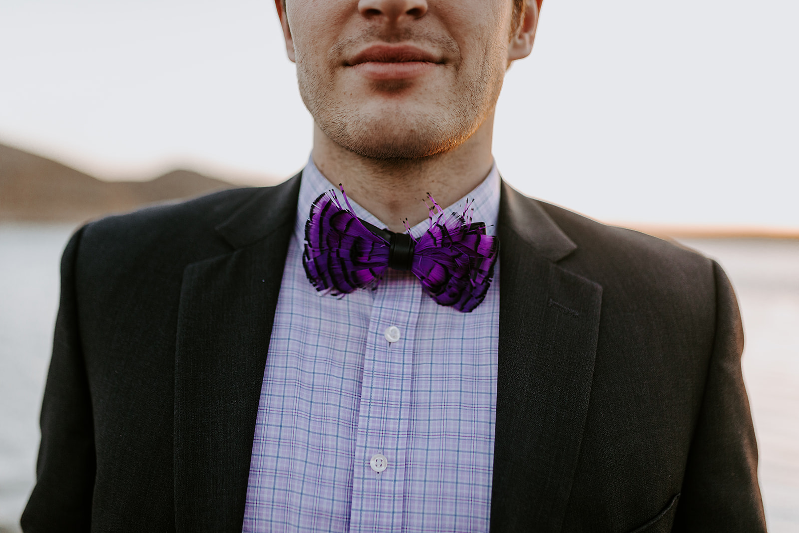 purple bow tie on groom