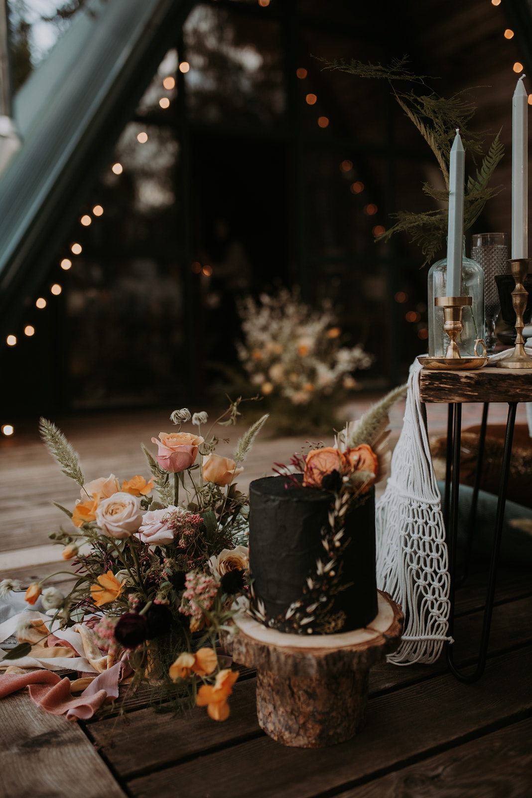 Mount Rainier elopement photographer captures intimate moment at cozy a-frame cabin, Woodsy wedding details, boho cake