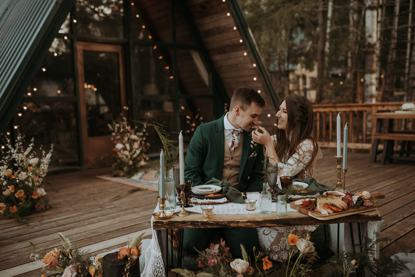 Mount Rainier elopement photographer captures intimate moment at cozy a-frame cabin, Woodsy wedding details, charcuterie
