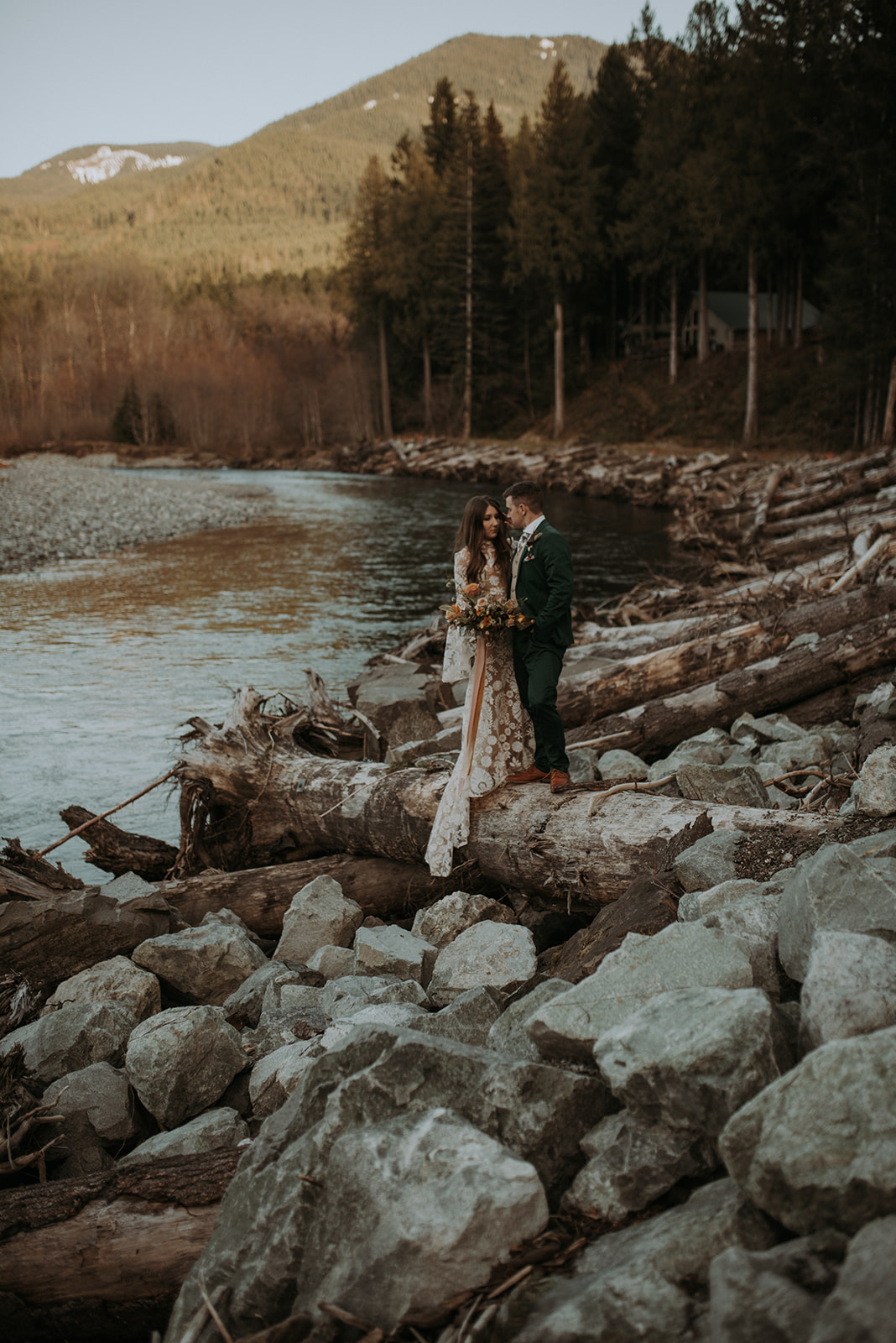 Mount Rainier elopement photographer captures intimate moment at cozy a-frame cabin, Woodsy wedding details, romantic
