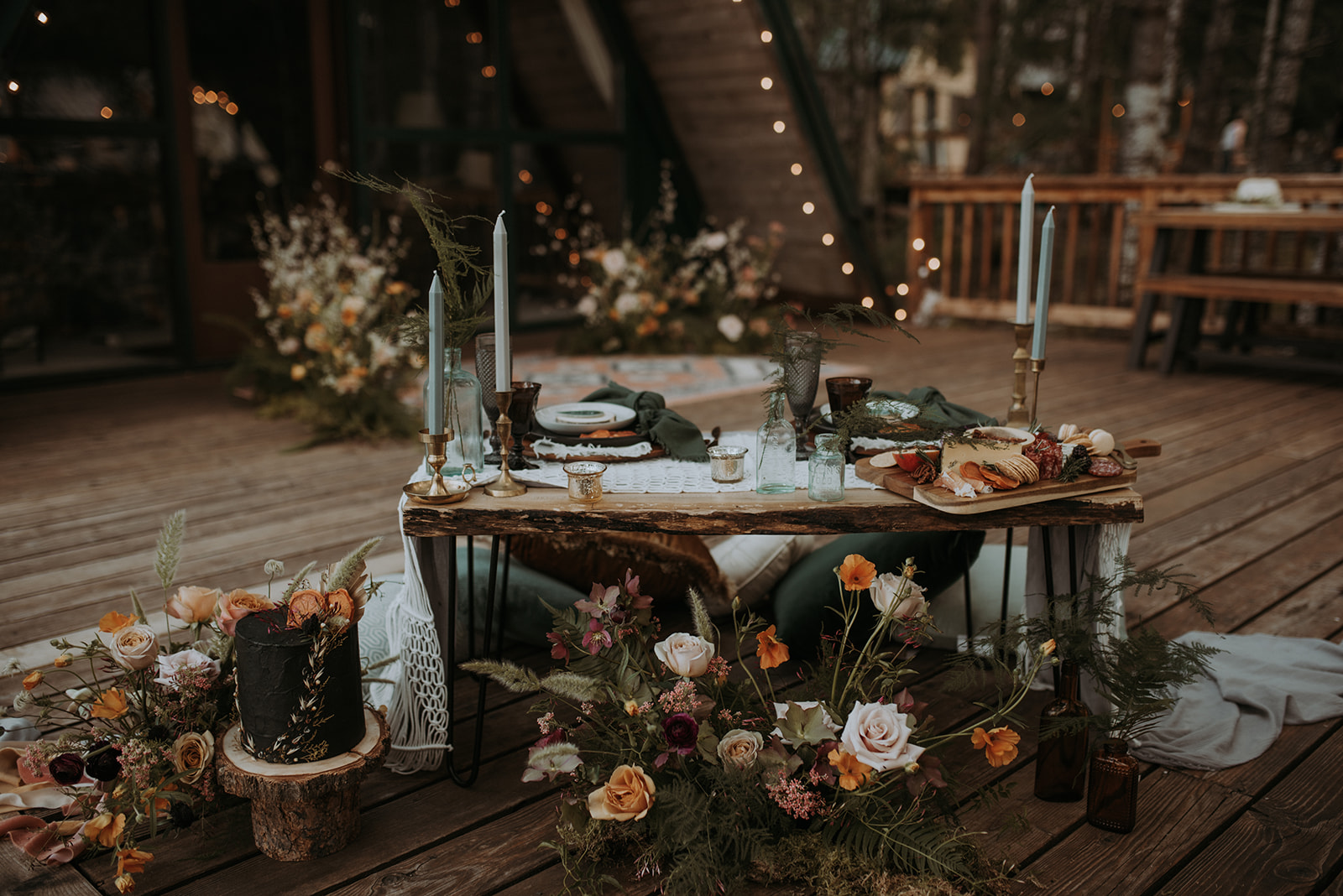 Mount Rainier elopement photographer captures intimate moment at cozy a-frame cabin, Woodsy wedding details, table scape