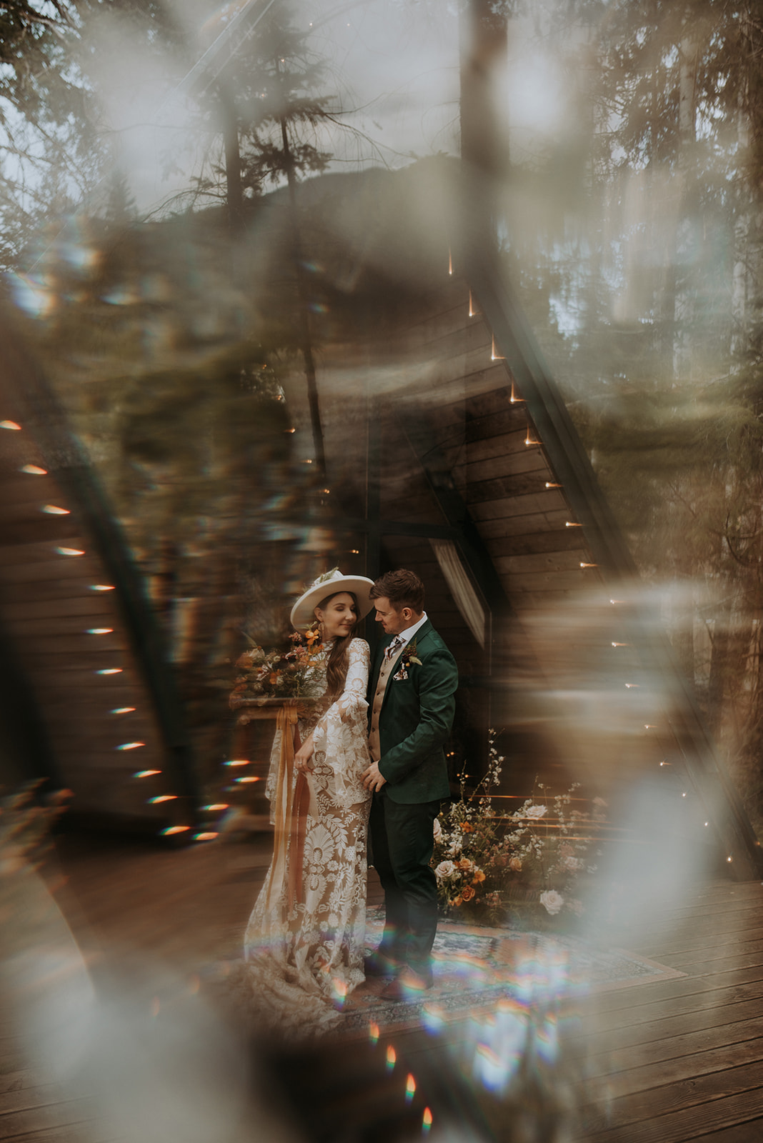 Mount Rainier elopement photographer captures intimate moment at cozy a-frame cabin, Woodsy wedding details