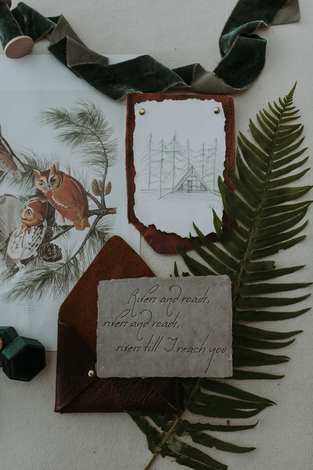 Mount Rainier elopement photographer captures intimate moment, stunning mountain backdrop, Woodsy wedding details, cabin