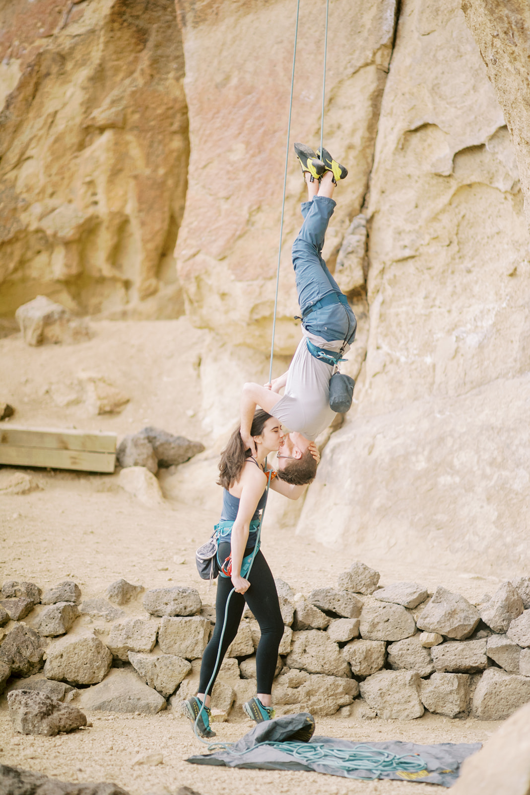 An upside-down kiss while climbing at Smith Rock