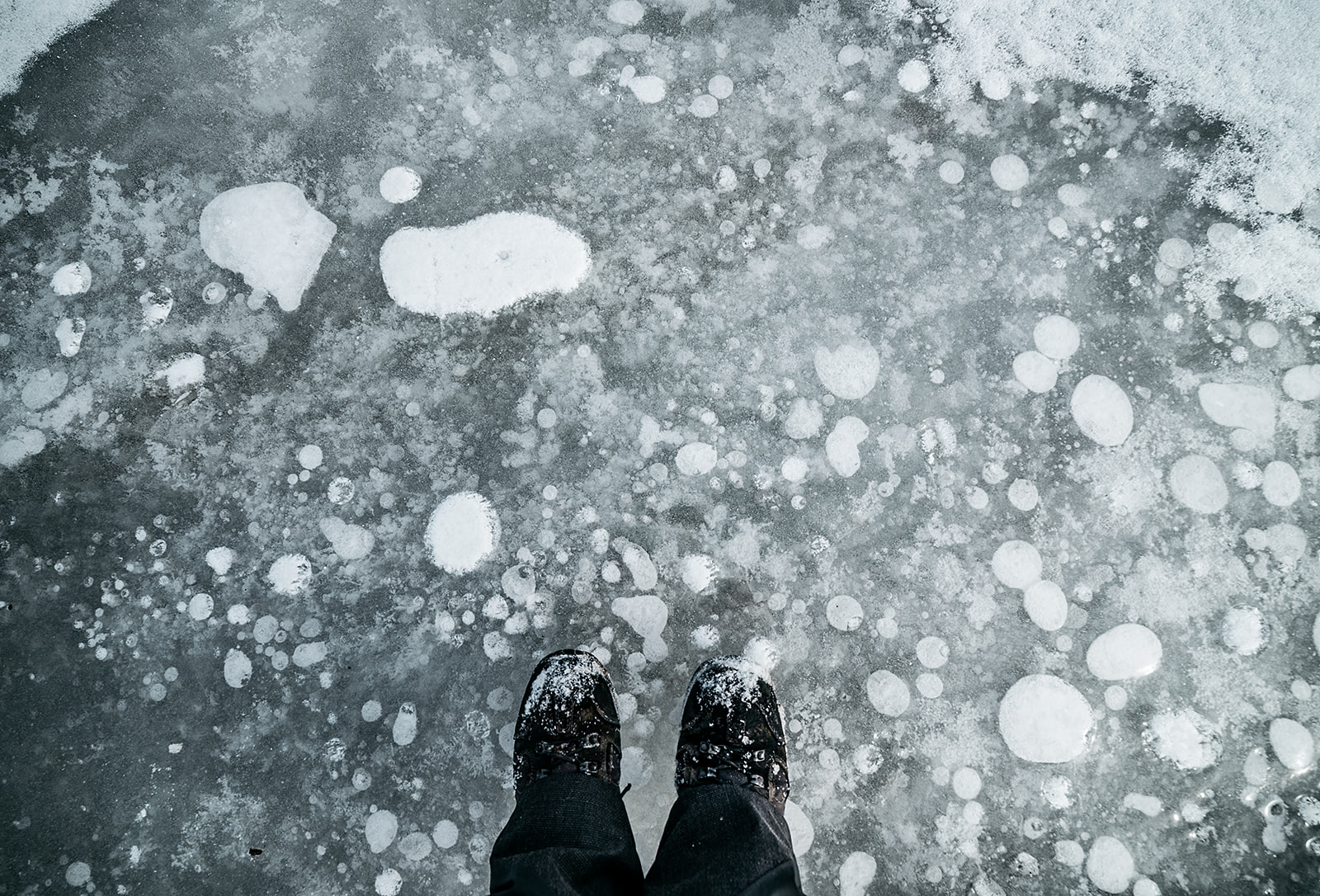 feet on icy underground on Svalbard