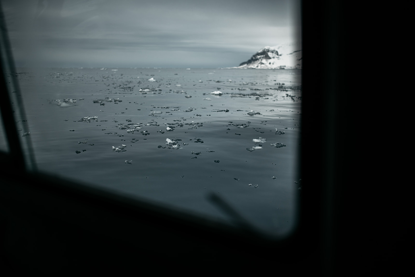ice floating outside a boat on Svalbard