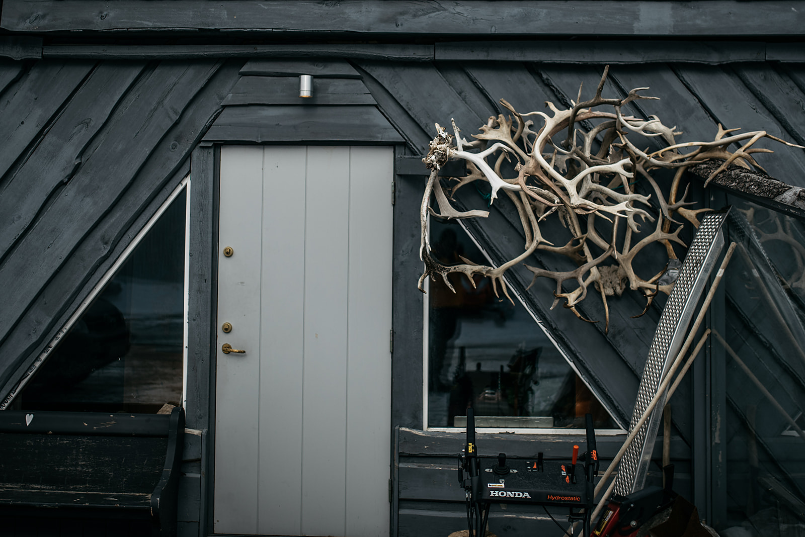 reindeer antlers at entrance of a house on Svalbard